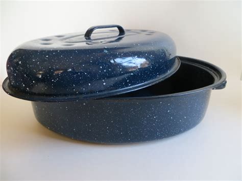 A roasting pan is perfect to bake a whole turkey, but make sure it fits in your oven and has a well-fitting rack inside. . Blue speckled enamel roasting pan